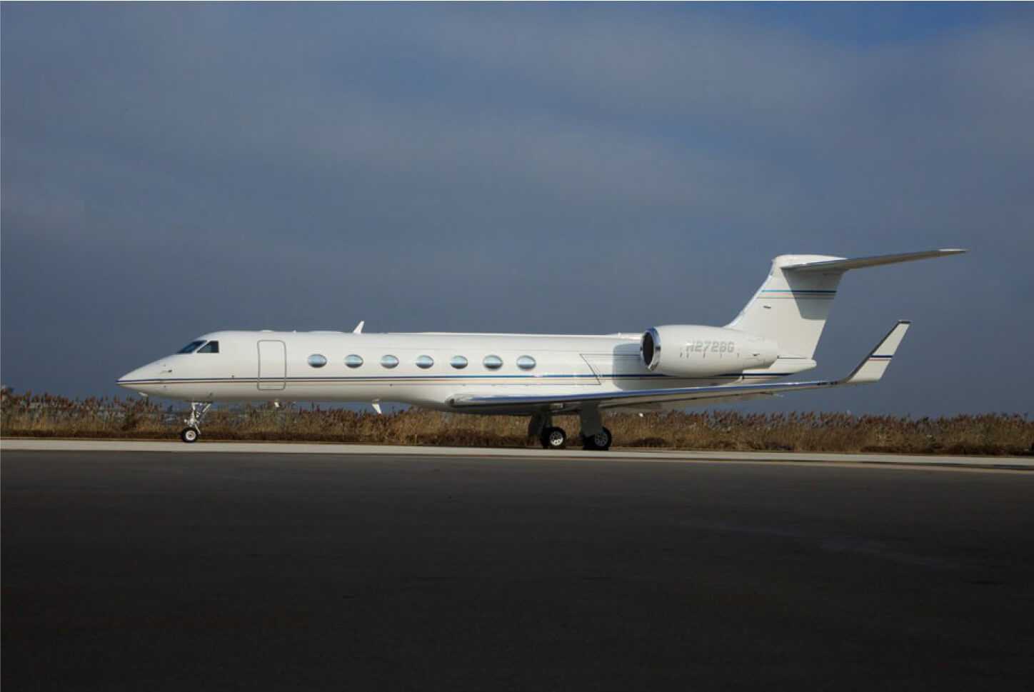 A Gulfstream G550 Model in White Color on Runway